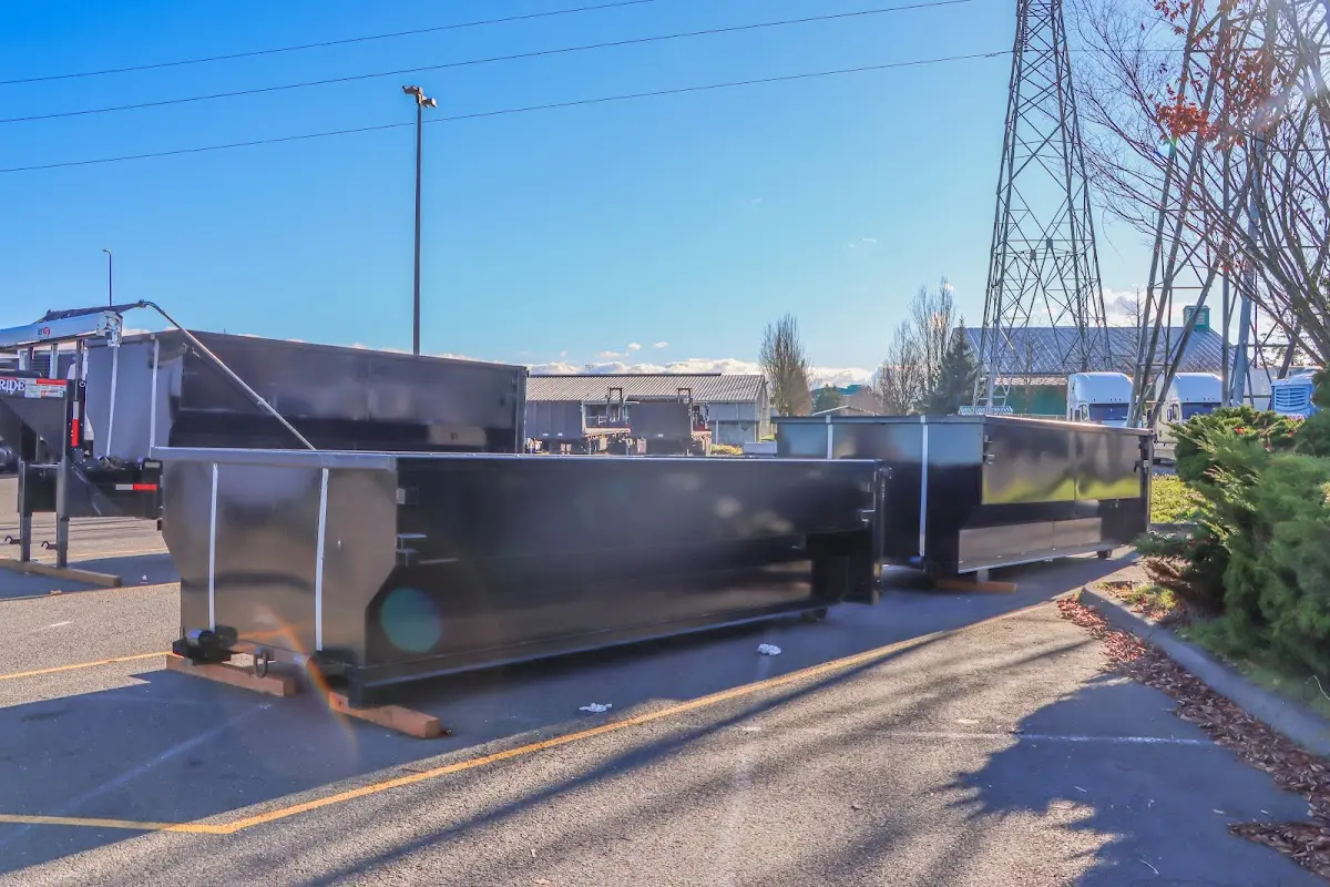 Roll-off dumpster ready for waste disposal at job site for Yard Waste Dumpster Rental in Cameron